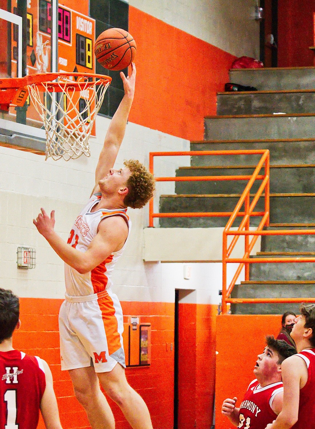 Dawson Pendergrass shows his leaping ability, making two of his dozen points look easy.